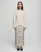 MSCH Copenhagen Magnolia Skirt with shimmering sequin detailing, designed in a flattering high waisted silhouette with a straight cut fit. Crafted from a comfortable polyester and elastane blend, this statement skirt adds a touch of glamour to both casual styling and elevated evening looks.
