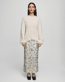 MSCH Copenhagen Magnolia Skirt with shimmering sequin detailing, designed in a flattering high waisted silhouette with a straight cut fit. Crafted from a comfortable polyester and elastane blend, this statement skirt adds a touch of glamour to both casual styling and elevated evening looks.