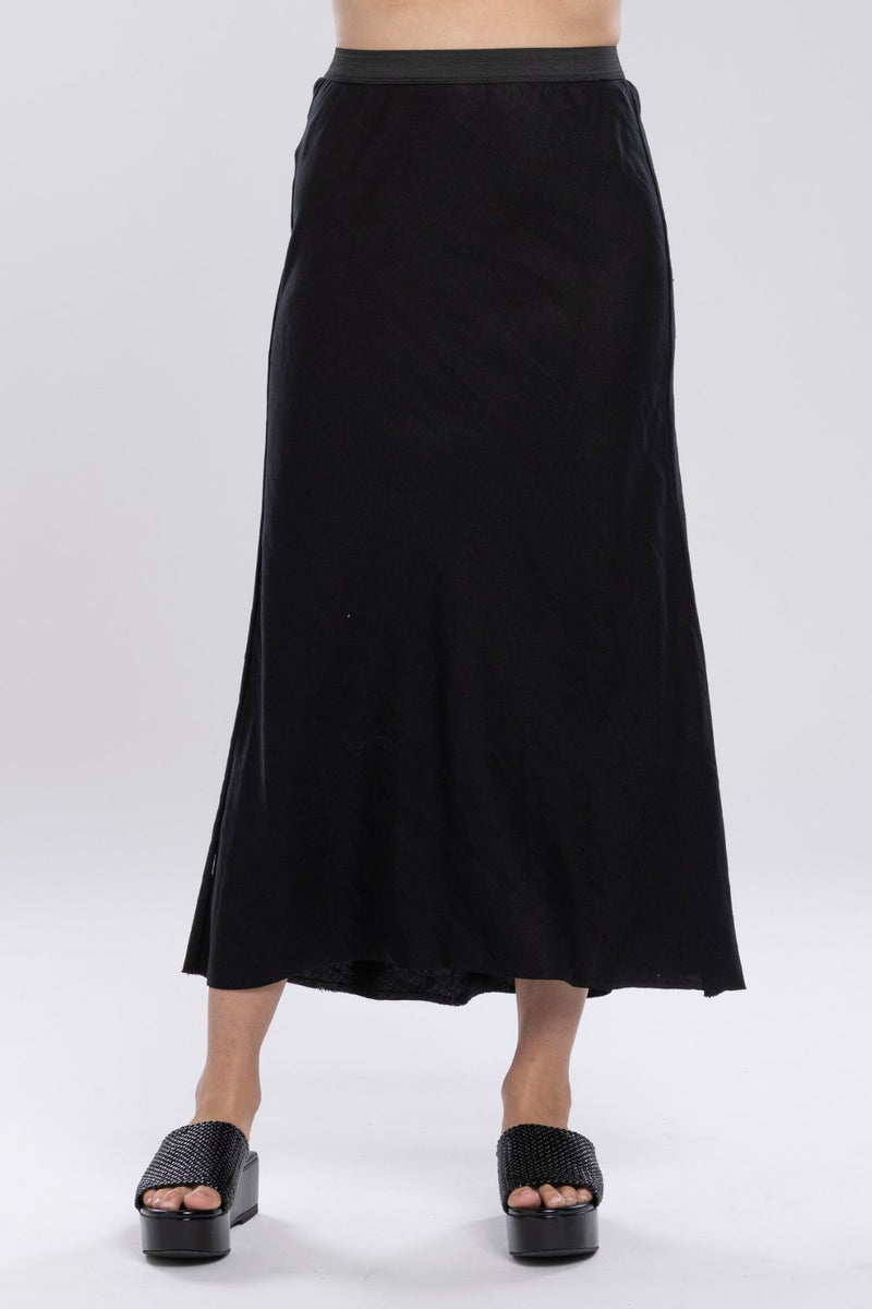 The NES Linen Muse Skirt – a bias cut linen blend skirt with elastic waist and modern hemline. Lightweight, flattering and NZ made.
