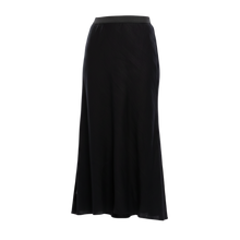 The NES Linen Muse Skirt – a bias cut linen blend skirt with elastic waist and modern hemline. Lightweight, flattering and NZ made.