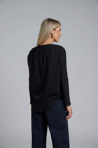 The NES Sable Top by N-E-S – a floaty georgette long sleeve top with scoop neck, curved hem and layering options. NZ made.