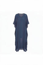 A TITAN sheer maxi dress with a V-neckline and draped, wide sleeves, displayed on a clean white background. Remi Dress