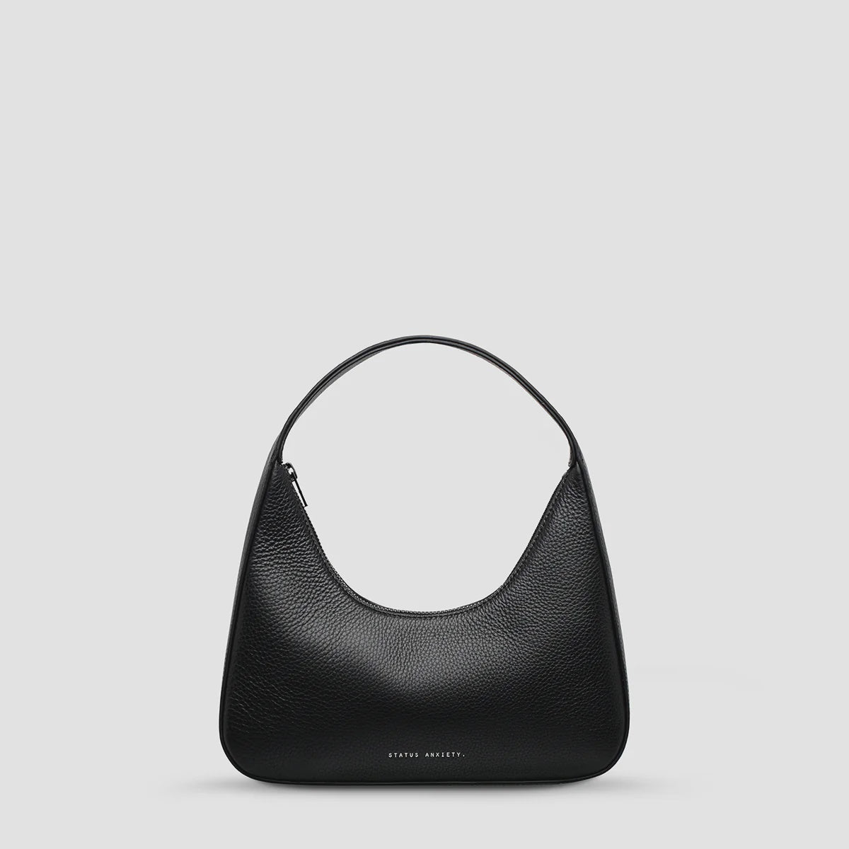 Status Anxiety
A mystical and romantic encounter. 'Aurora' with her dressier, more structured form fits perfectly under your shoulder, making her the perfect wingwoman for chance meetings of the night.