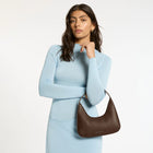 Status Anxiety
A mystical and romantic encounter. 'Aurora' with her dressier, more structured form fits perfectly under your shoulder, making her the perfect wingwoman for chance meetings of the night.