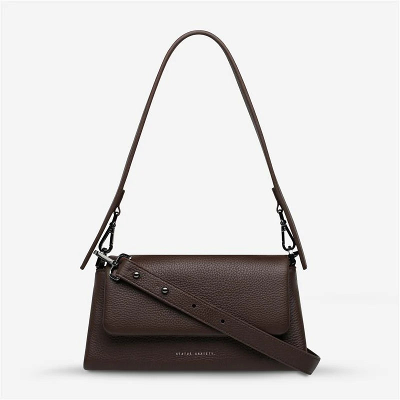We don't take calling this bag Zenith lightly. As the new high point of your bag collection, 'Zenith' comes with a longer strap for use as a relaxed crossbody, or swap in the shorter strap to transform her into a dressier shoulder bag. On the back of the bag there's a slider pocket for easy phone storage/access, and on the front, a fancy magnet close flap that'll have you opening and closing her just for the hell of it.